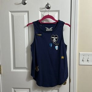 Chaser..distressed tank with patches in a small and color is Navy